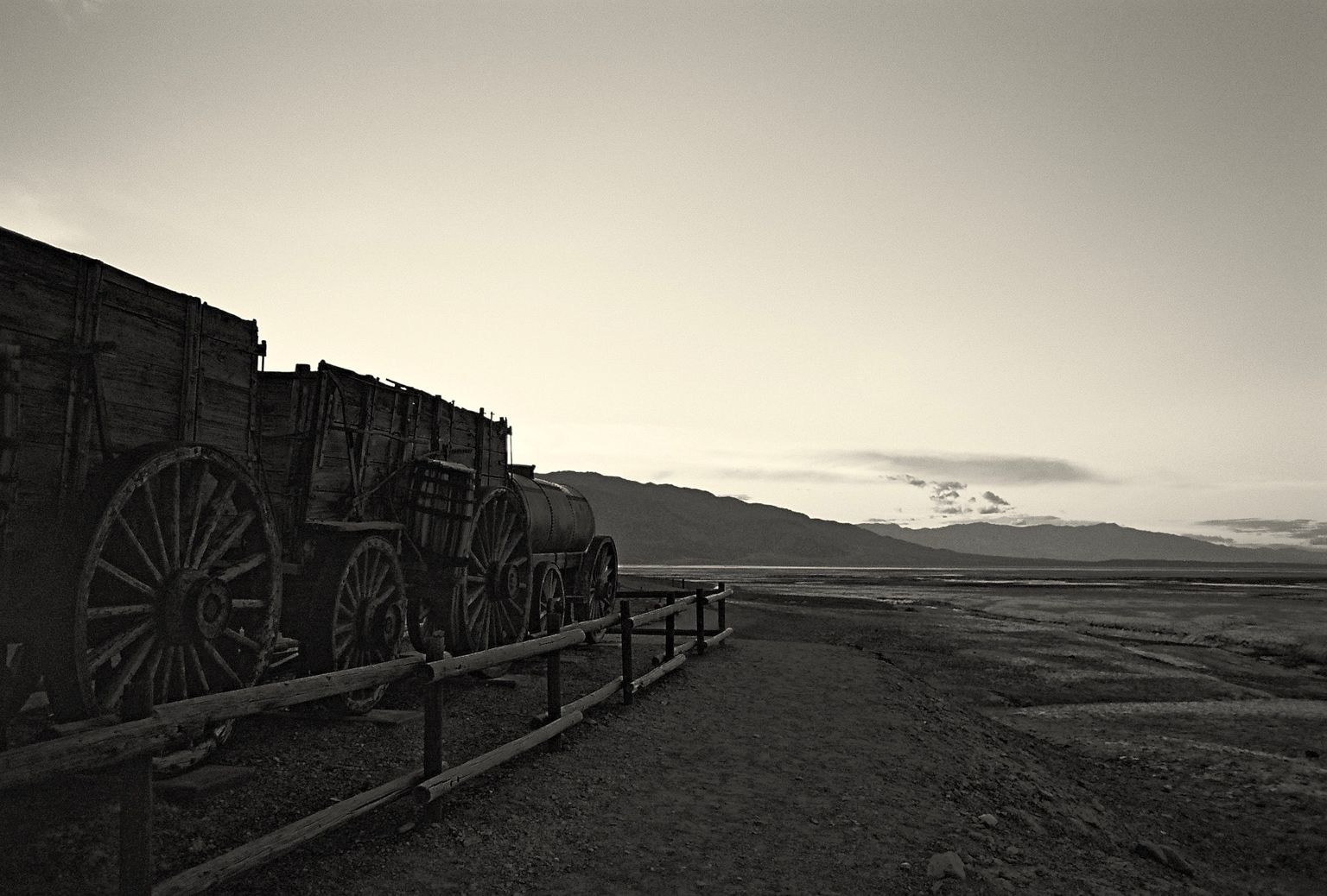 Black-and-white photo of a train car in Death Valley